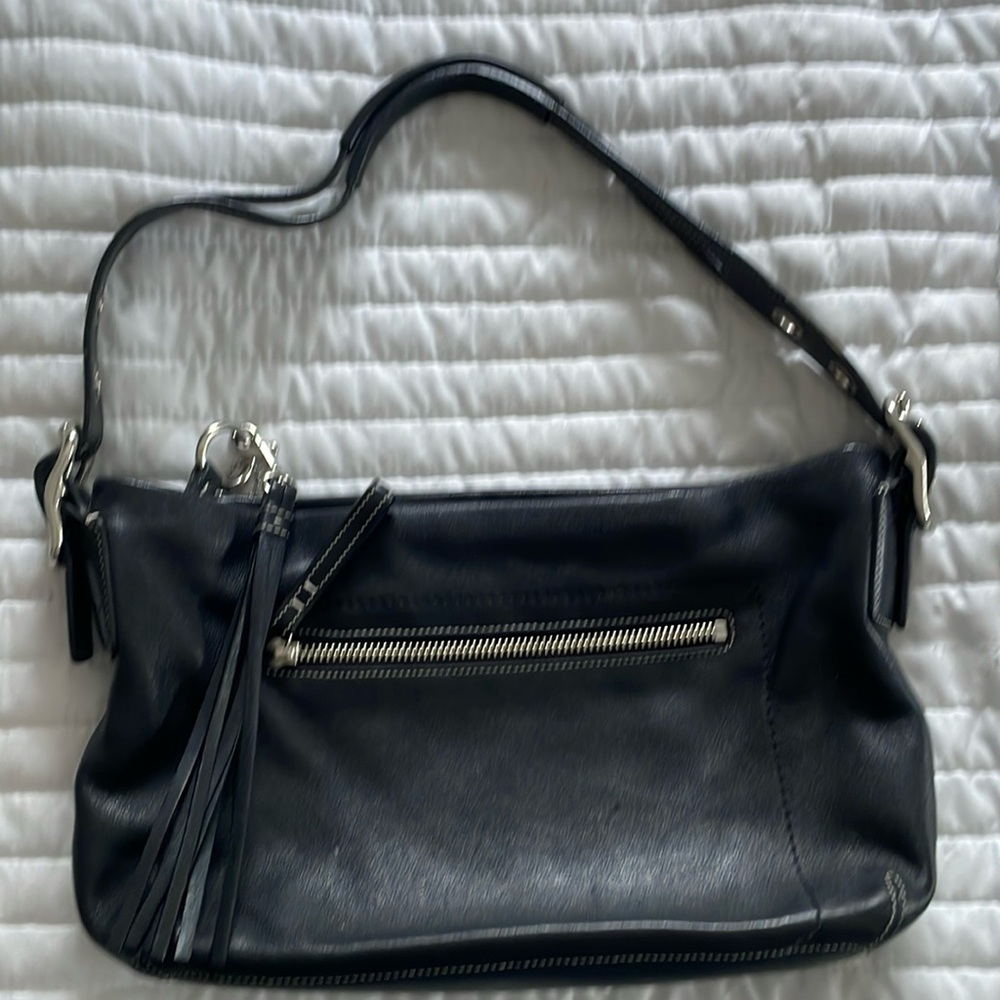 Coach purse with tassel